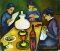 Drei von der Lampe August Macke am Tisch Frauen